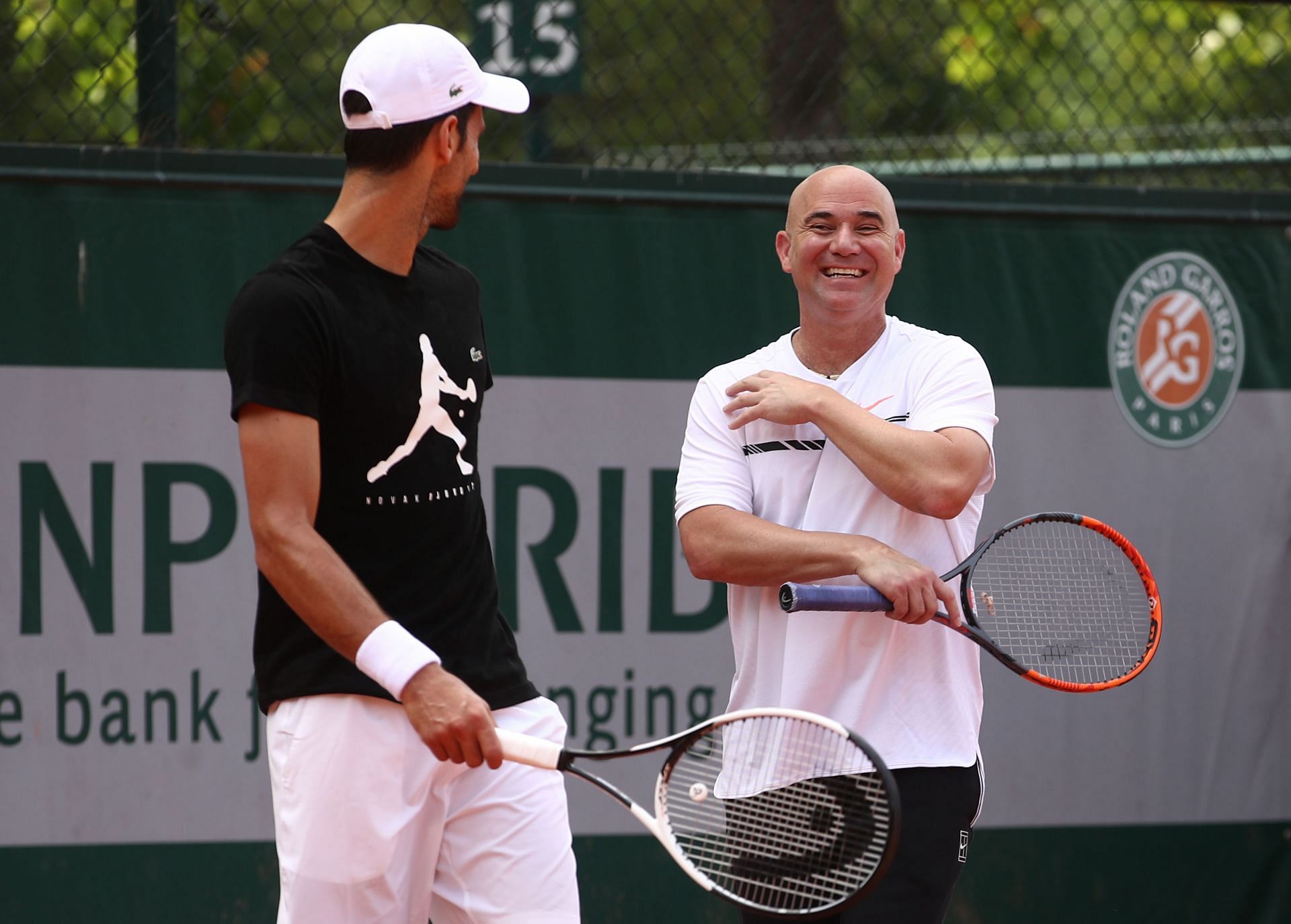 Novak Djokovic and Andre Agassi pictured at the 2017 French Open | Image Source: Getty
